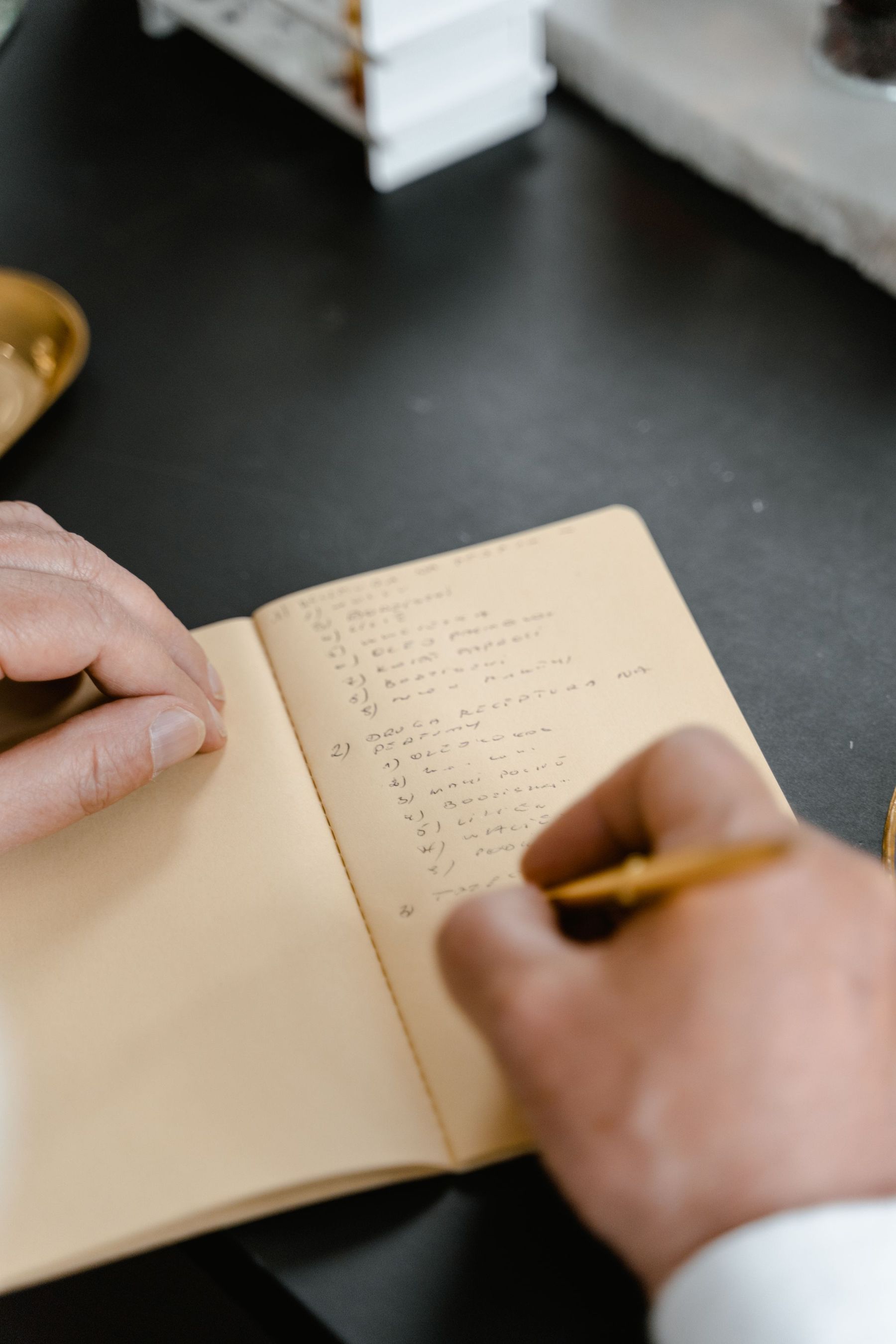 A formula written in a notebook