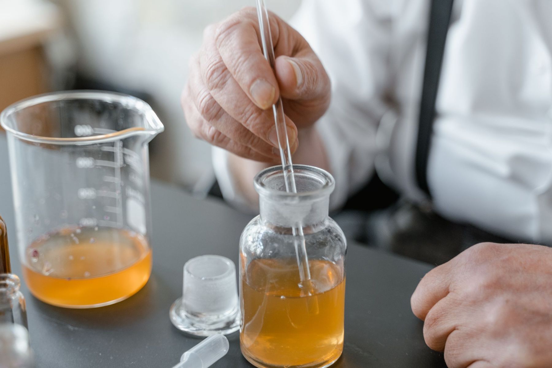 Working with a beaker and glass rod
